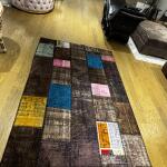 Earthline Patchwork Rug – Handmade Dark Brown with Color Highlights