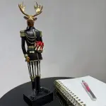 Black Jacket Handmade Deer Figurine Holding a Gift Box