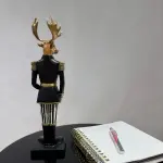 Black Jacket Handmade Deer Figurine Holding a Gift Box