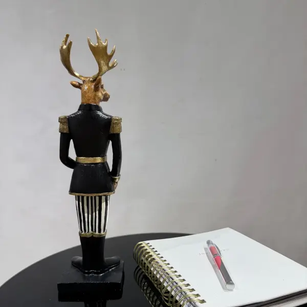 Black Jacket Handmade Deer Figurine Holding a Gift Box