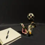 Clown Sculpture with Checkered Ball – Unique Decorative Figurine