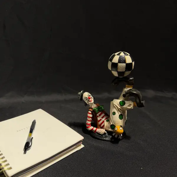 Clown Sculpture with Checkered Ball – Unique Decorative Figurine