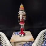 Nutcracker Statue with Layered Cake Design