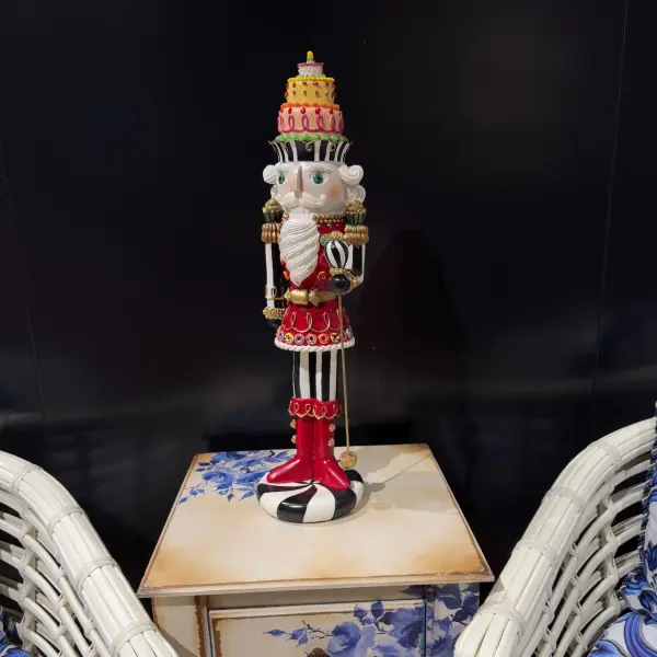 Nutcracker Statue with Layered Cake Design