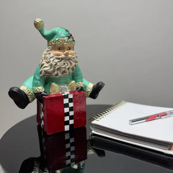Ferozzi Playful Green Santa on Gift Box Figurine – Handcrafted Whimsical Holiday Decor