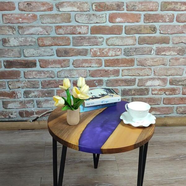Walnut Accent Table with black metal legs and purple epoxy decorations.