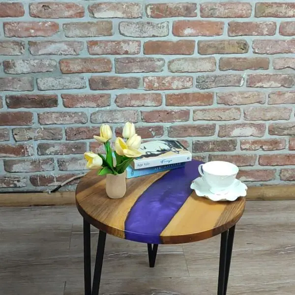 Walnut Accent Table with black metal legs and purple epoxy decorations.