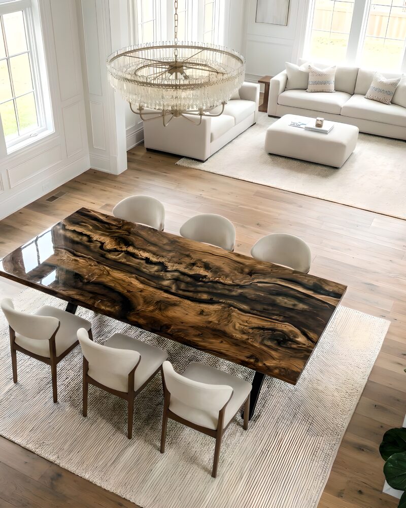 Custom resin dining table with upholstered chairs in a bright Georgia dining room
