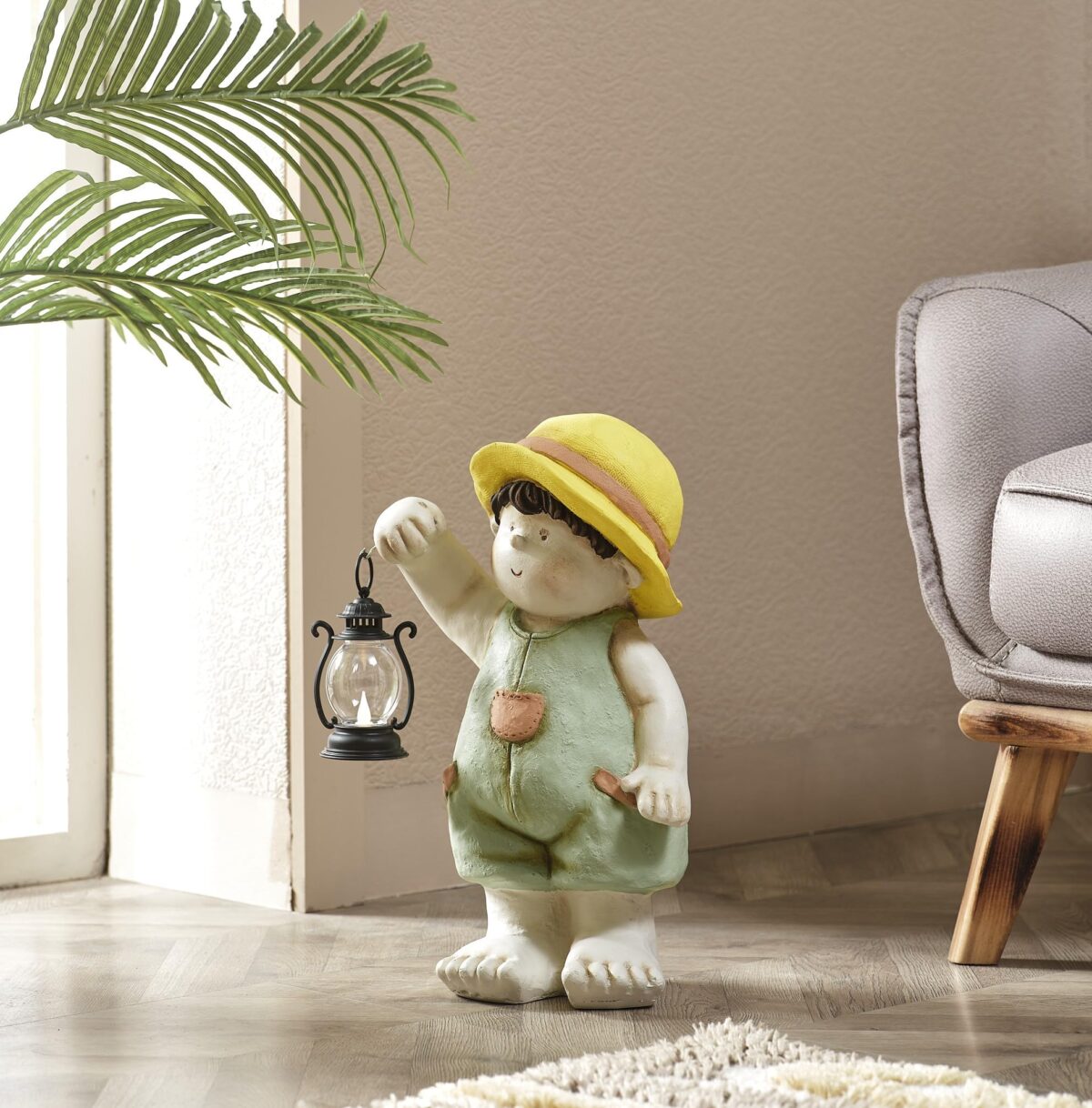 Colorful Boy Holding a Lantern Sculpture