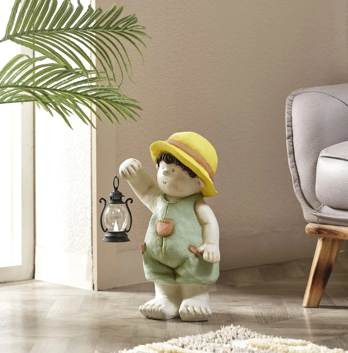 Colorful Boy Holding a Lantern Sculpture