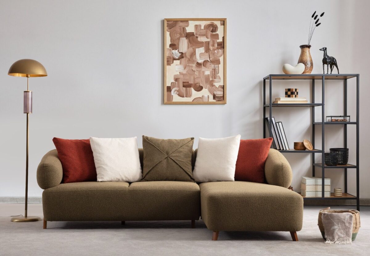 Cardea olive green chaise sectional in a styled living room with shelving – Ferozzi