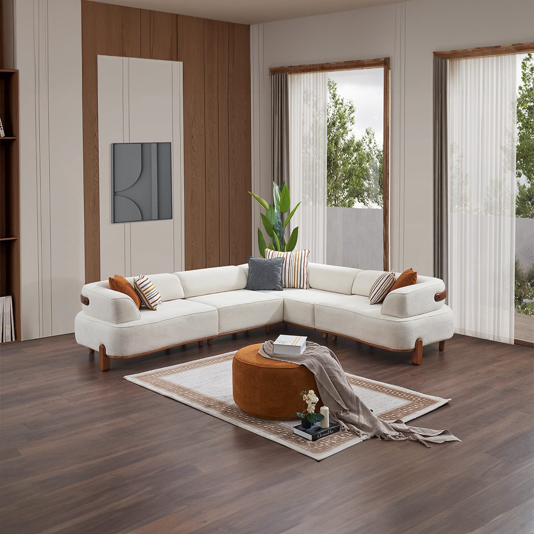Vision corner sectional in light cream with round ottoman in a modern living room – Ferozzi